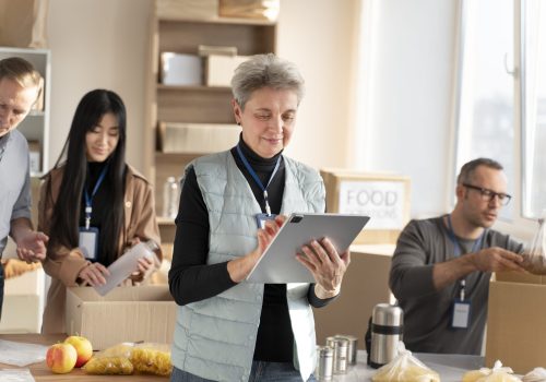 close-up-volunteers-managing-donations